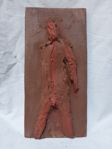 Étude pour un bouffon - bas-relief - ciment sur bois © Clément